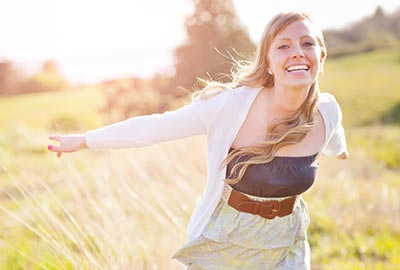 woman fully enjoying outside nature